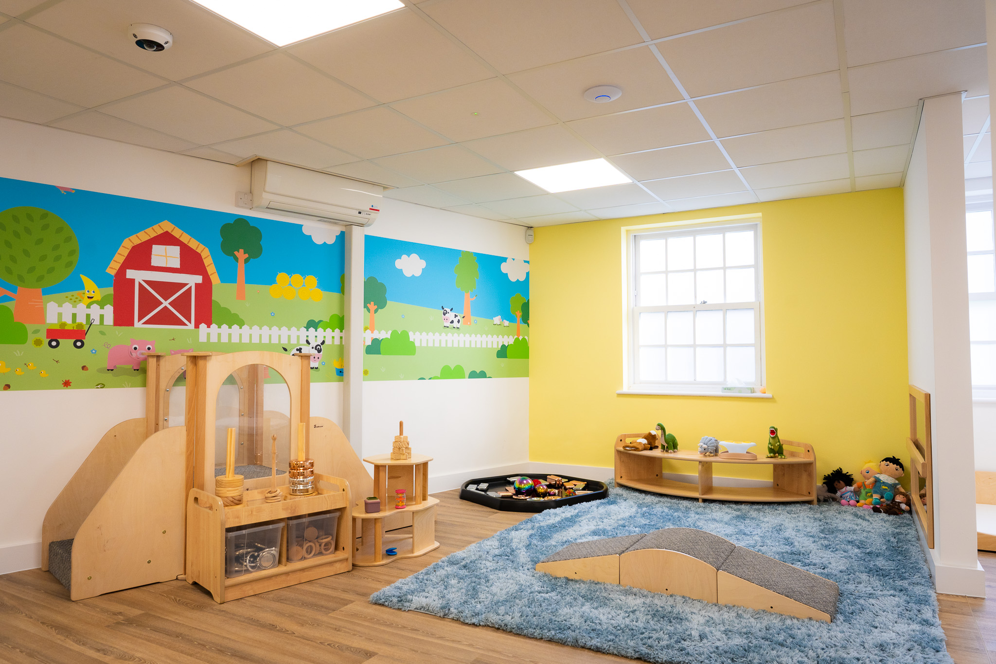 nursery room with wooden toys